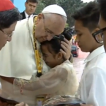Pope Francis with little girl